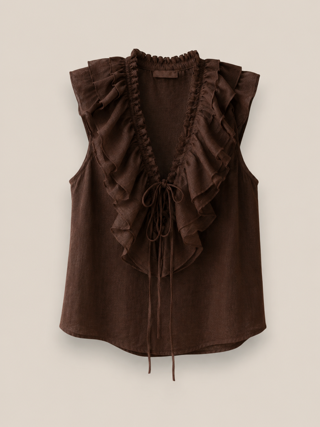 Blusa Roma chocolate sin mangas con volantes en escote V y lazo de cinta en 100% algodón
