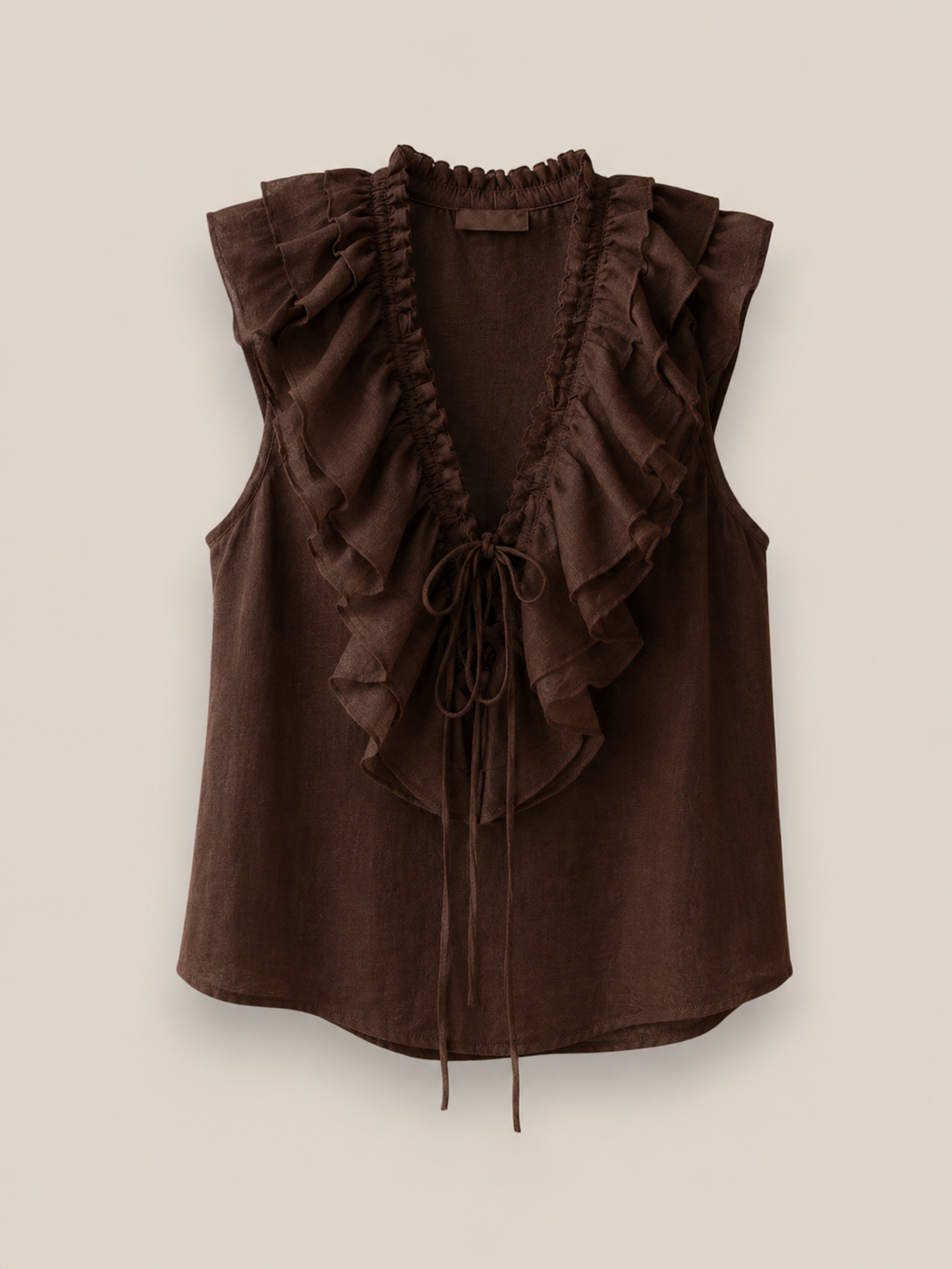Blusa Roma chocolate sin mangas con volantes en escote V y lazo de cinta en 100% algodón
