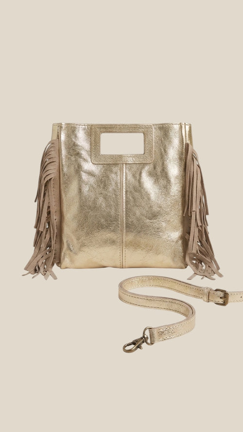 Bolso Aurea de piel dorada con flecos decorativos, asa corta y asa larga cruzada