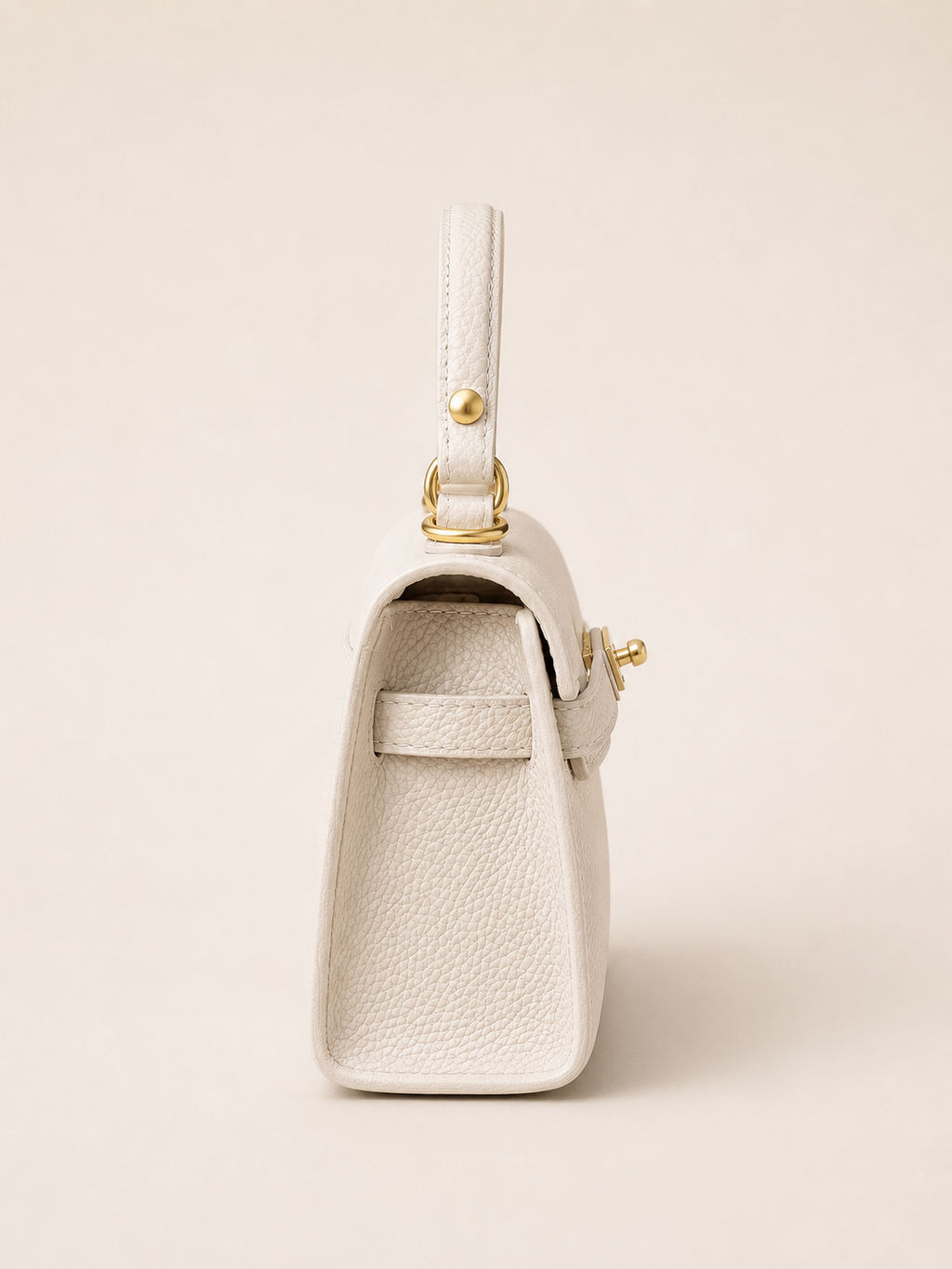Bolso Kelly Crema de piel con correa larga ajustable y extraíble, vista lateral