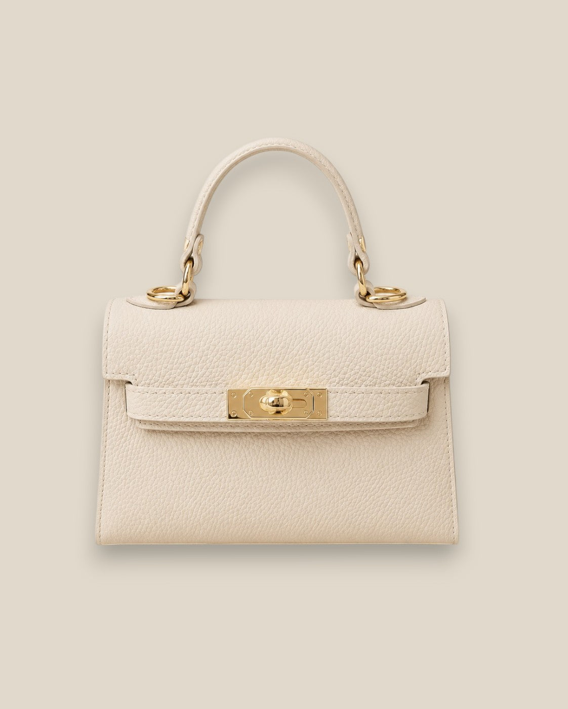 Bolso Kelly Crema de piel estructurado con asa corta y detalles metálicos dorados, vista frontal