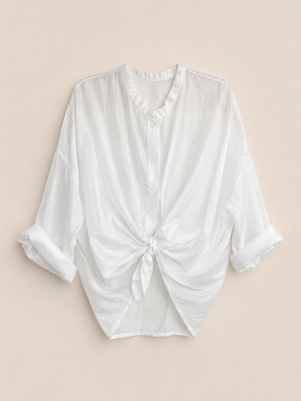 Camisa blanca semitransparente, ligera y fluida