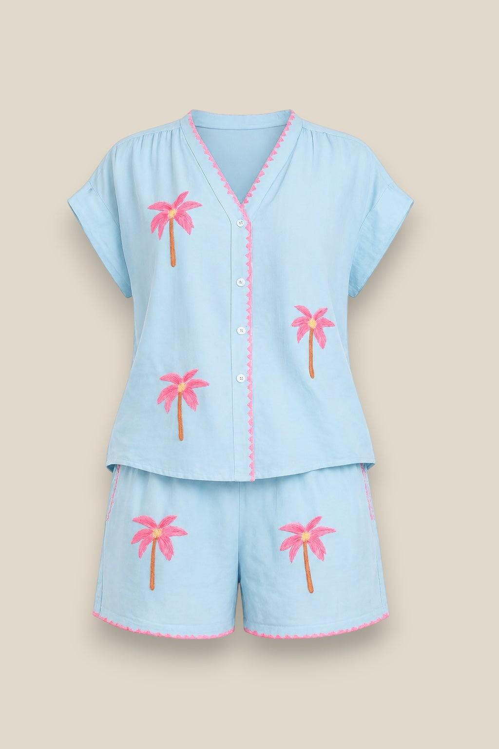 Conjunto Menorca celeste: camisa y short de algodón con palmeras bordadas en rosa flúor