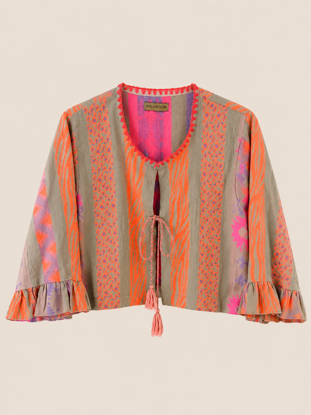 La chaquetita Kalami es una pieza única, realizada artesanalmente en algodón 100% procedente de la India naranja flúor marron y naranja
