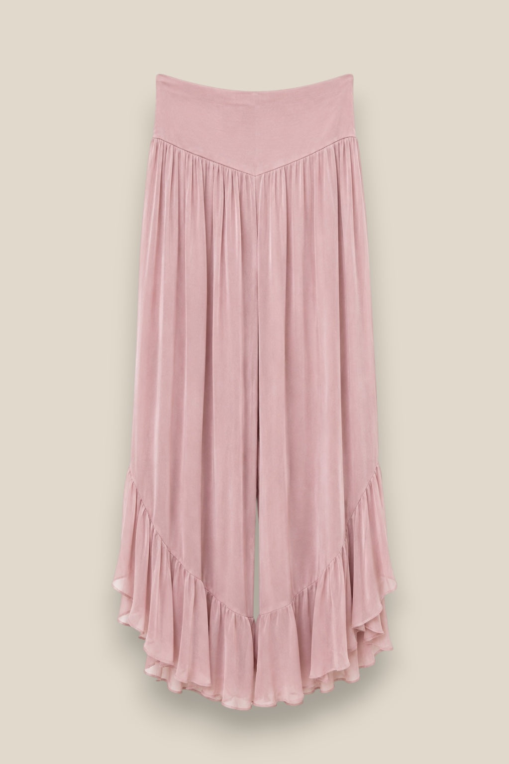 Pantalón de seda natural fluida con cintura alta elástica y acabado acampanado con volante rosa