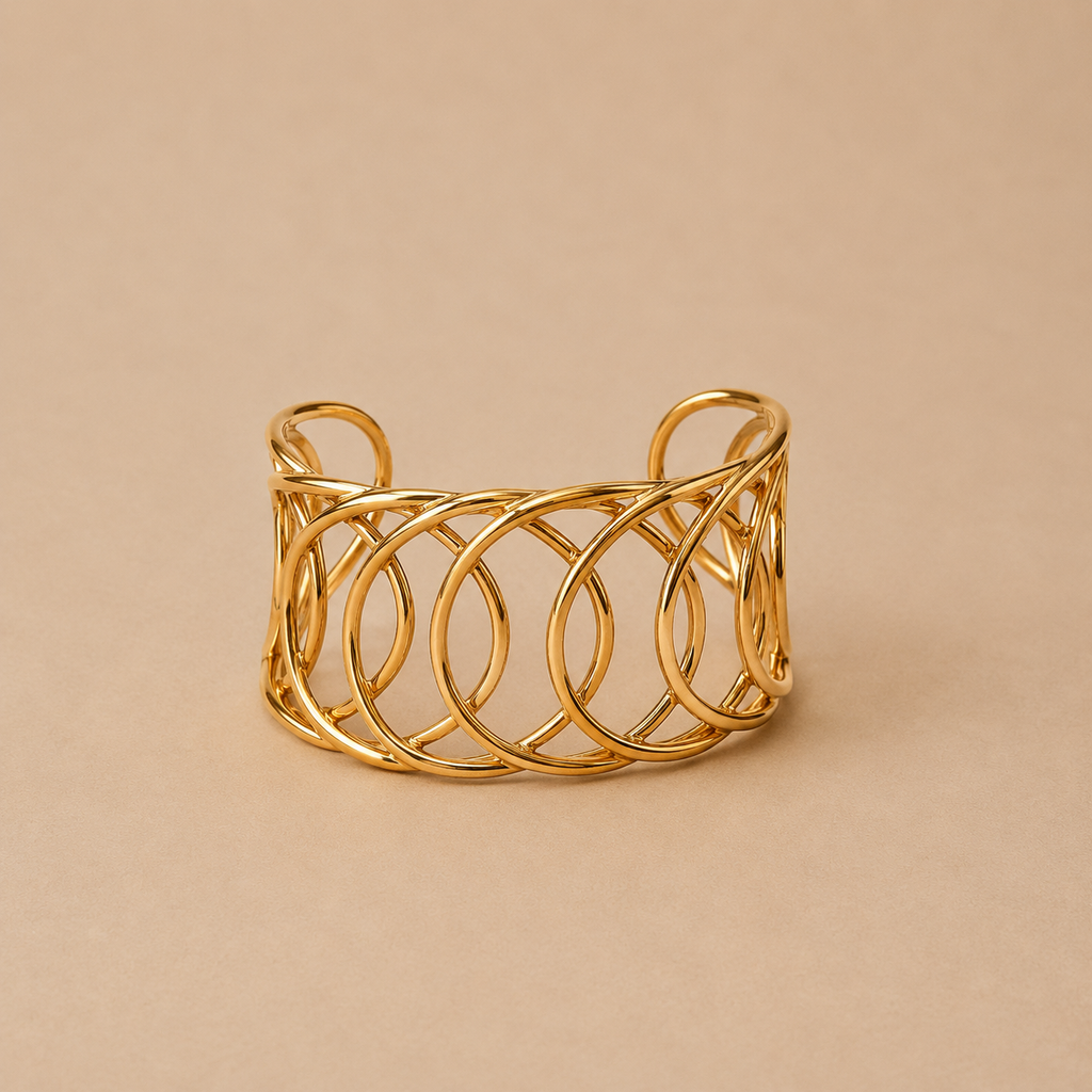 Pulsera rigida de acero inoxidable bañada en 18k