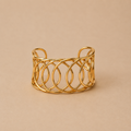 Pulsera rigida de acero inoxidable bañada en 18k