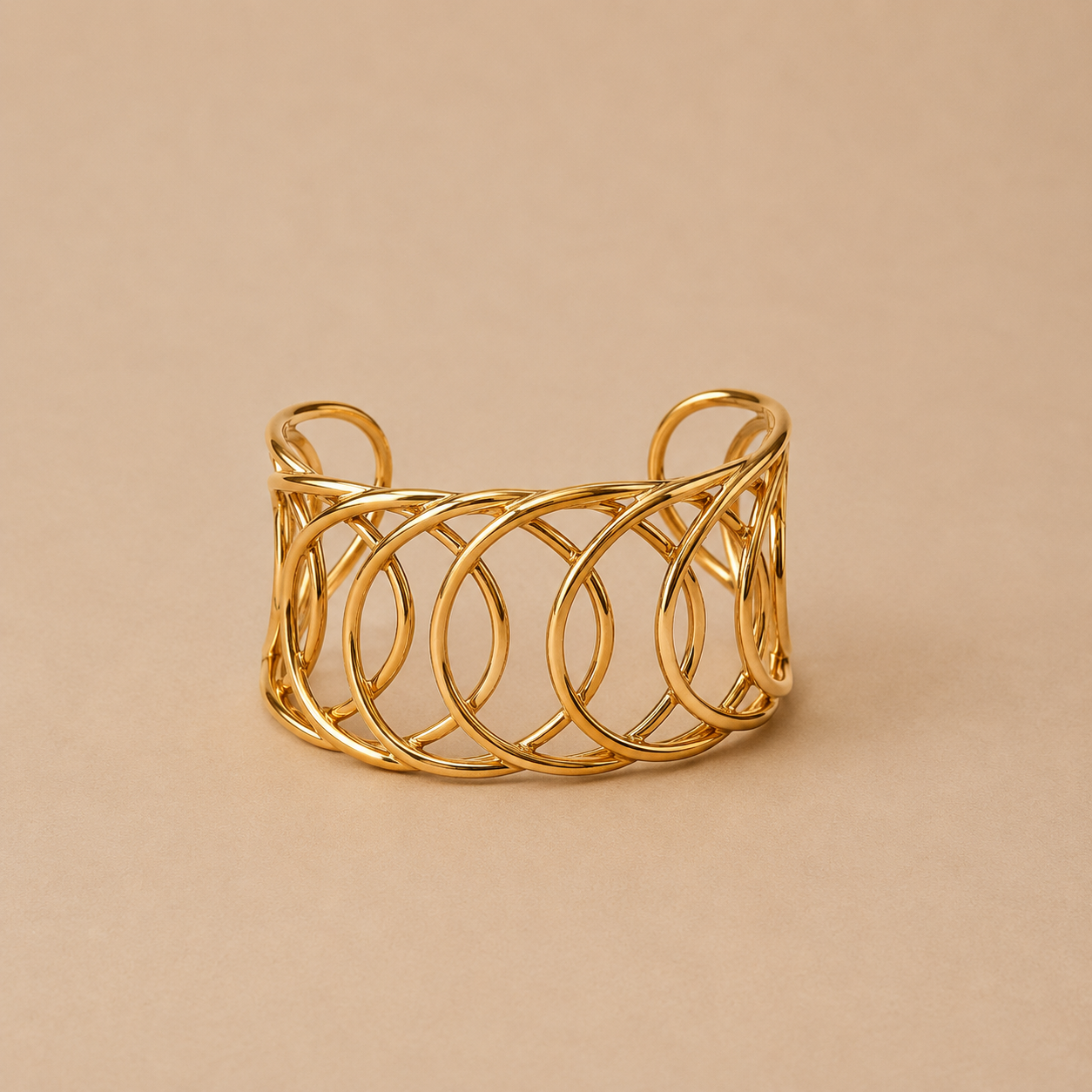 Pulsera rigida de acero inoxidable bañada en 18k