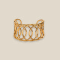 Pulsera rigida de acero inoxidable bañada en 18k enlazada